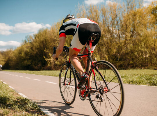 Cyclist rides on bicycle speed effect