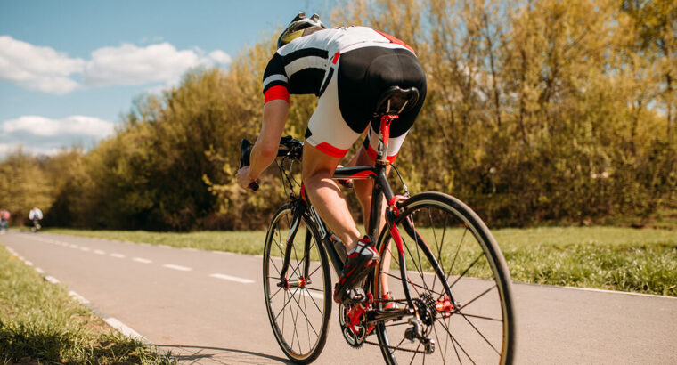 Cyclist rides on bicycle speed effect