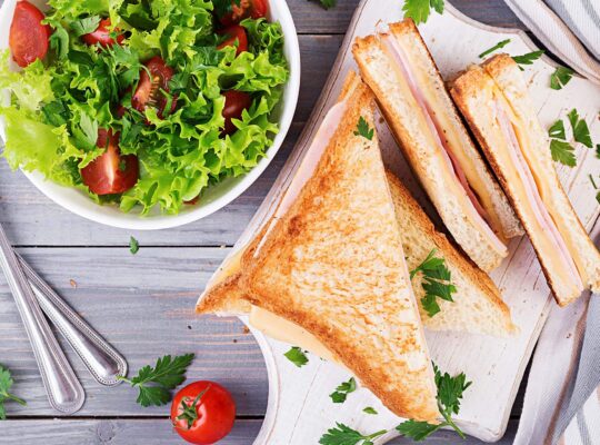 Sandwich with ham cheese and salad