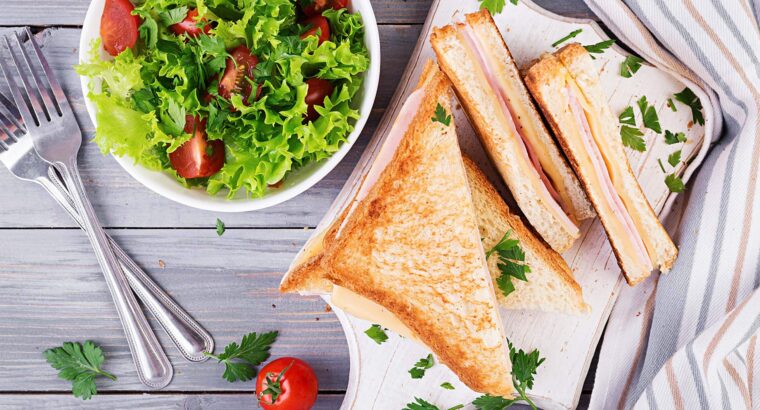 Sandwich with ham cheese and salad
